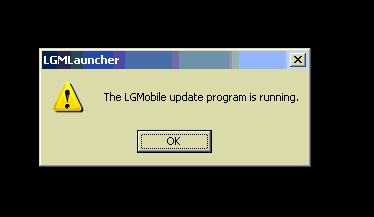 Screenshot of message box with text: The LG Mobile update program is running 